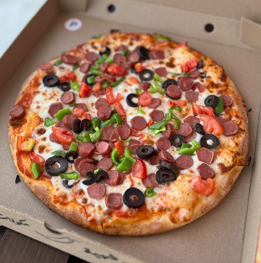 موقف البيتزا Pizza Parking النهضة — صورة 3